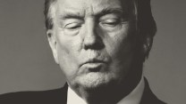 Close-up of Donald Trump looking down with his lips pursed.